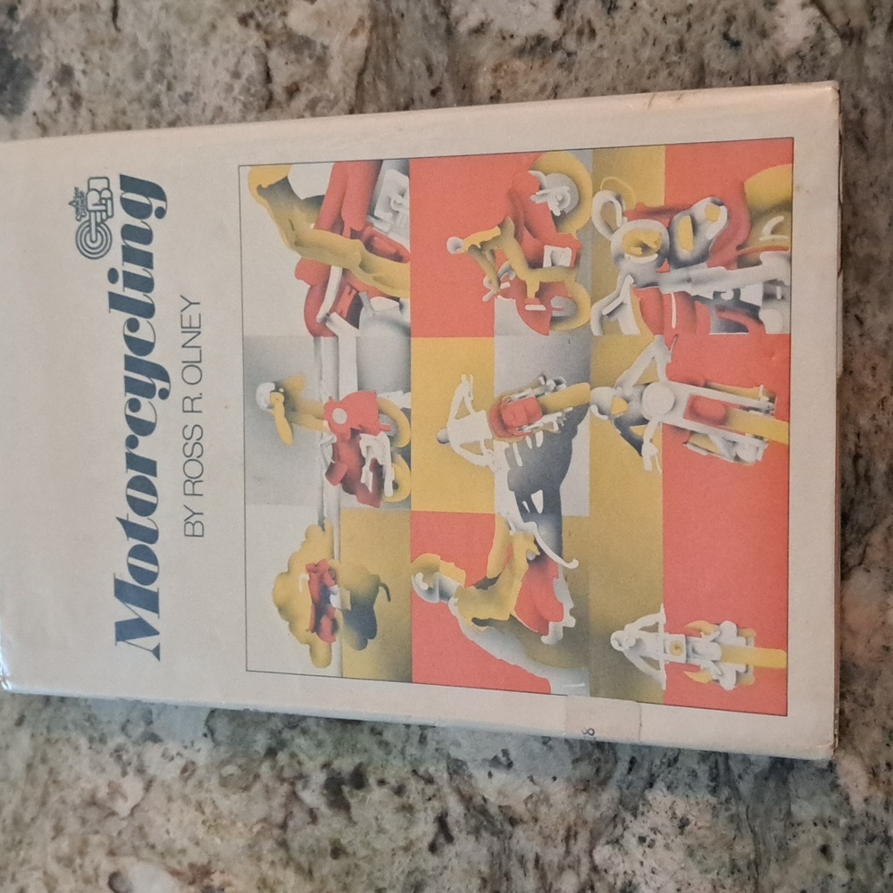 Motorcycling   By  Ross R. Olney